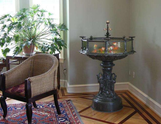 36 gallons freshwater fish tank (mostly fish and non-living decorations) - Victorian Style Aquarium, 36 gallon, with a brass & bronze central fountain

A hand made reproduction of an 1870's classic, which was one of the first American made aquariums.

57 inches tall X 38 inches wide