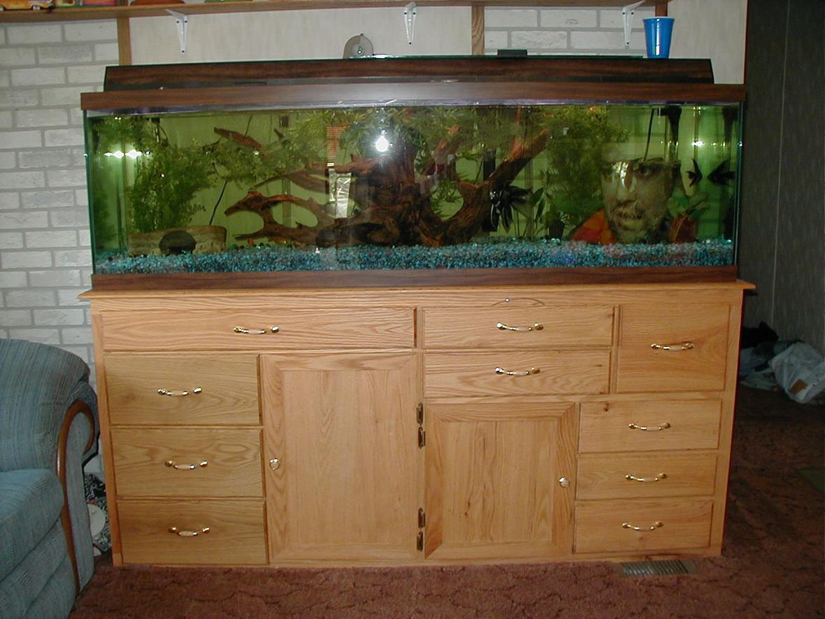 75 gallons freshwater fish tank (mostly fish and non-living decorations) - my sons 125 gal fresh water tank with the custom built stand built by me